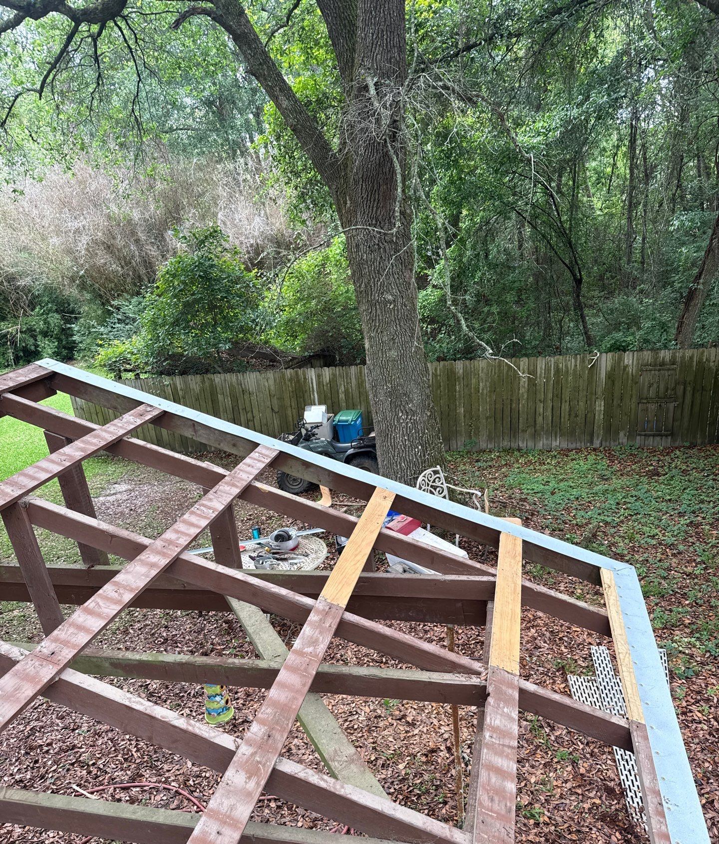 New framing and supports over the office lean-to in Ocean Springs so the crew could roof it safely