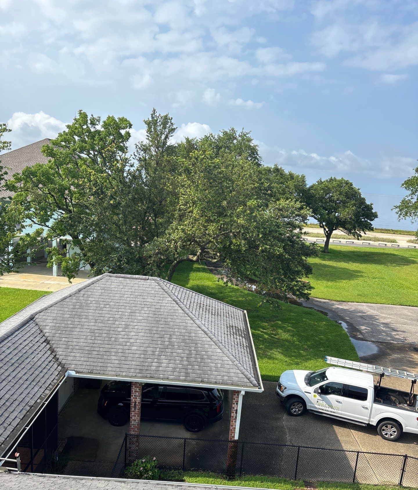The old shingle roof over the carport of the Pascagoula home seen from the main roof at the June 25 inspection