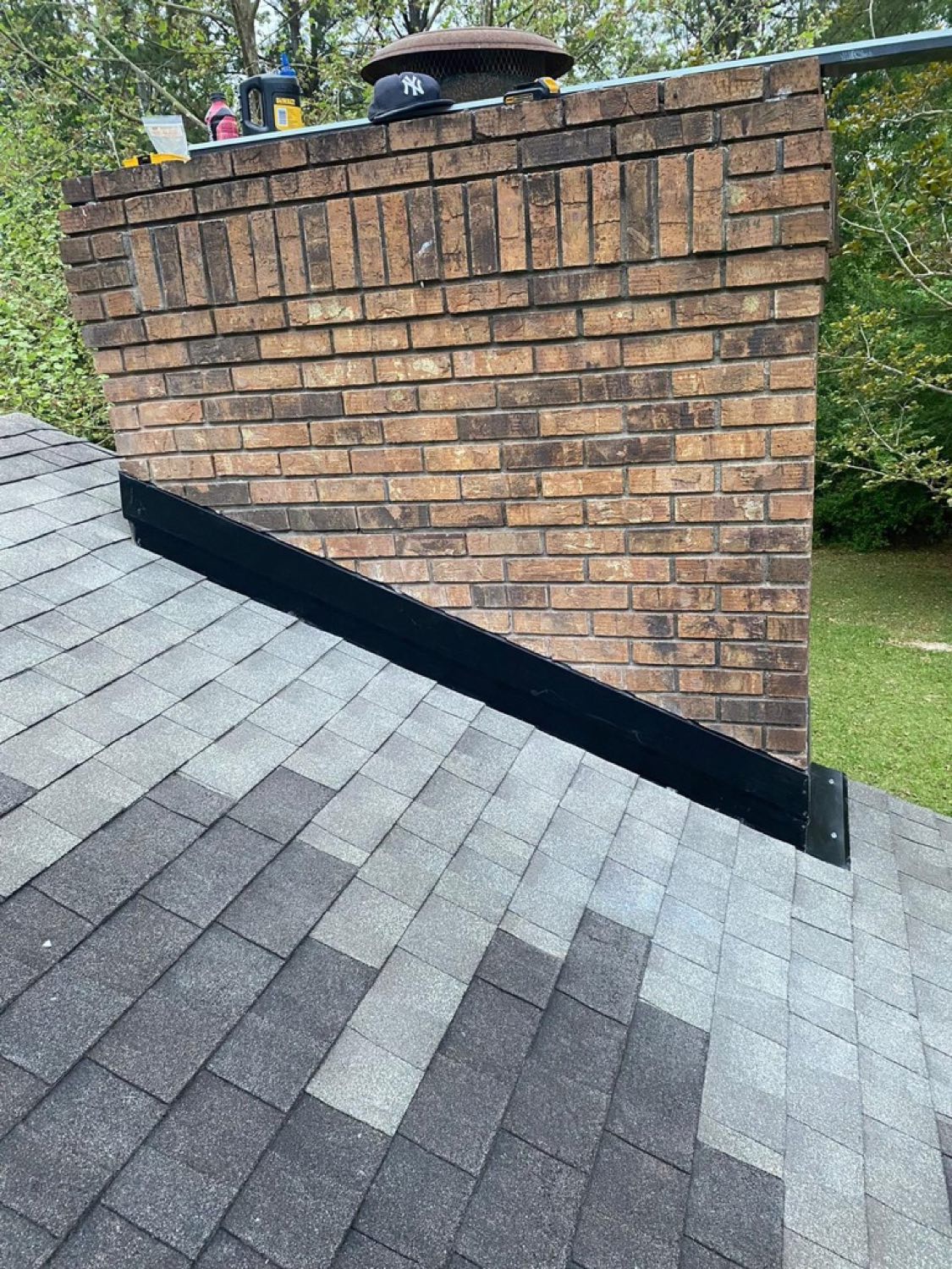 Custom flashing work at a roof transition by Gulf South Roofing