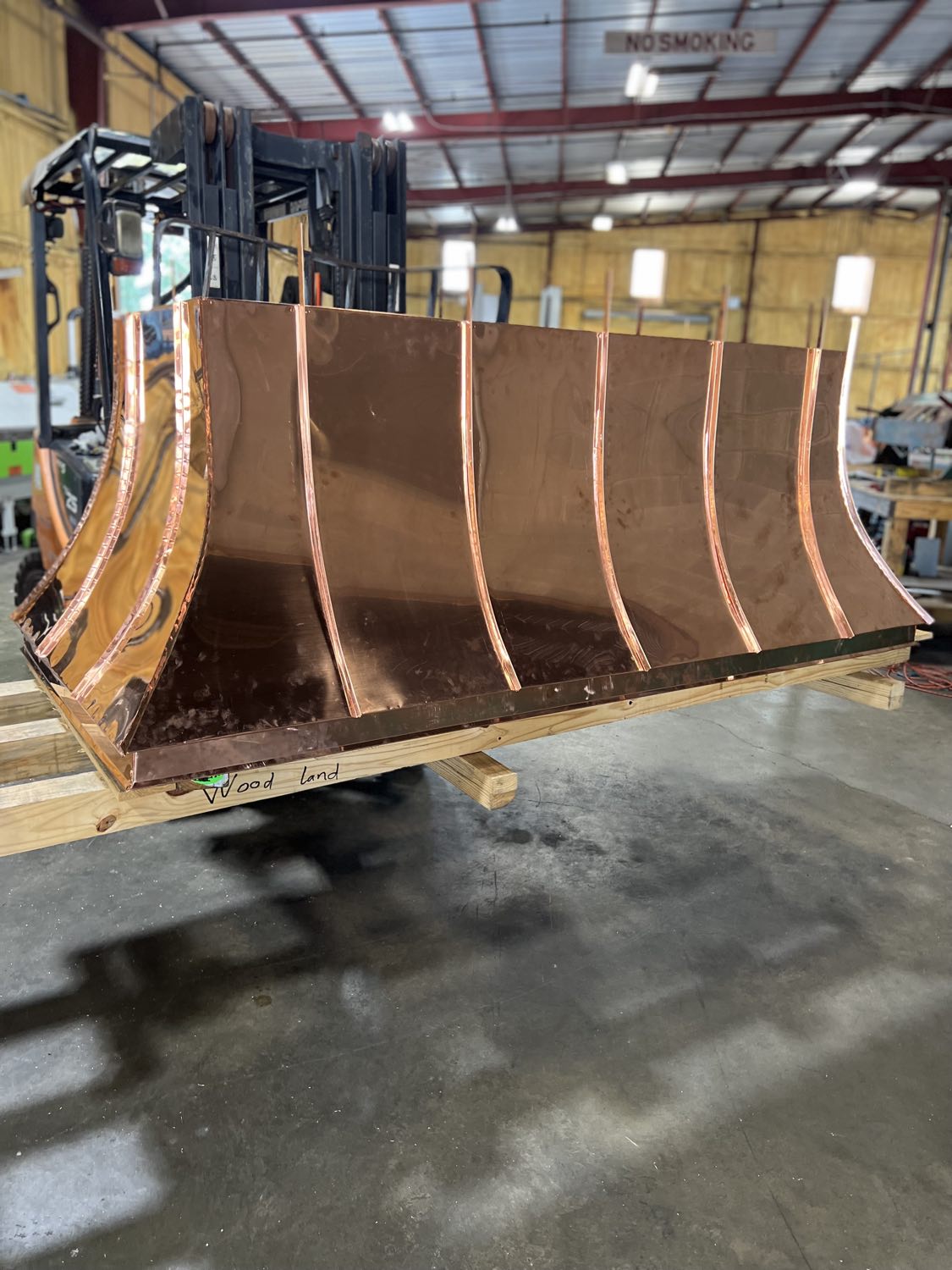 Custom copper work detail from the Gulf South Roofing sheet metal shop