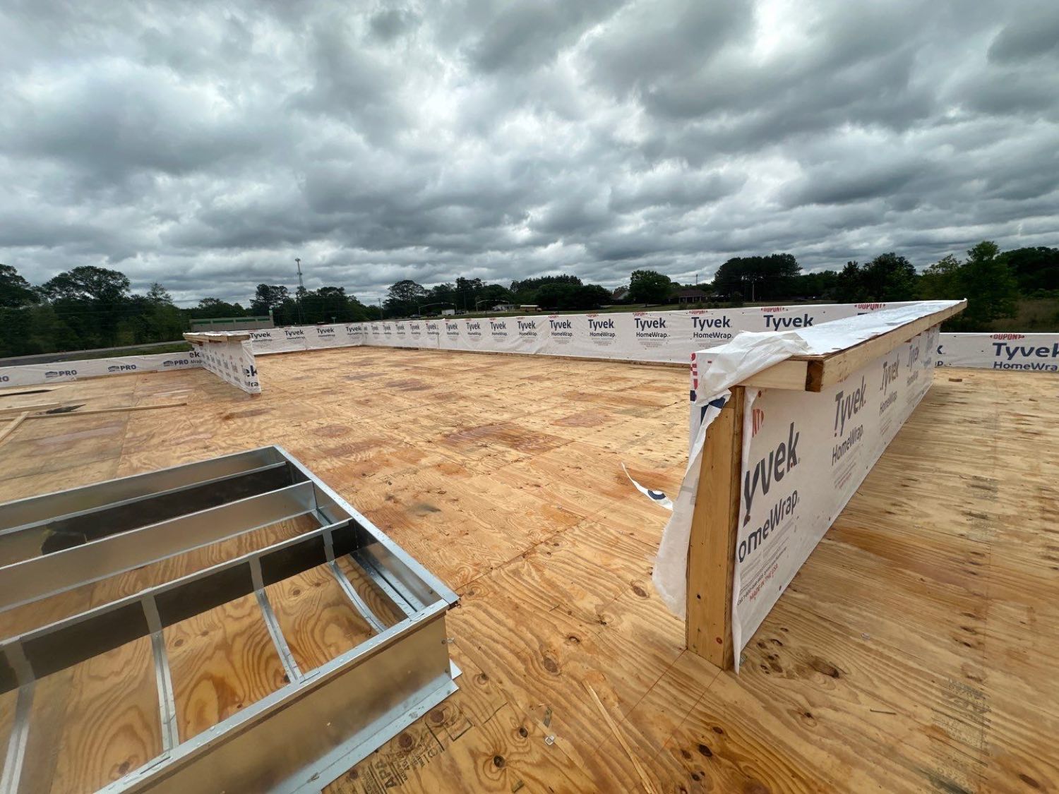 Membrane attachment underway on a commercial flat roof