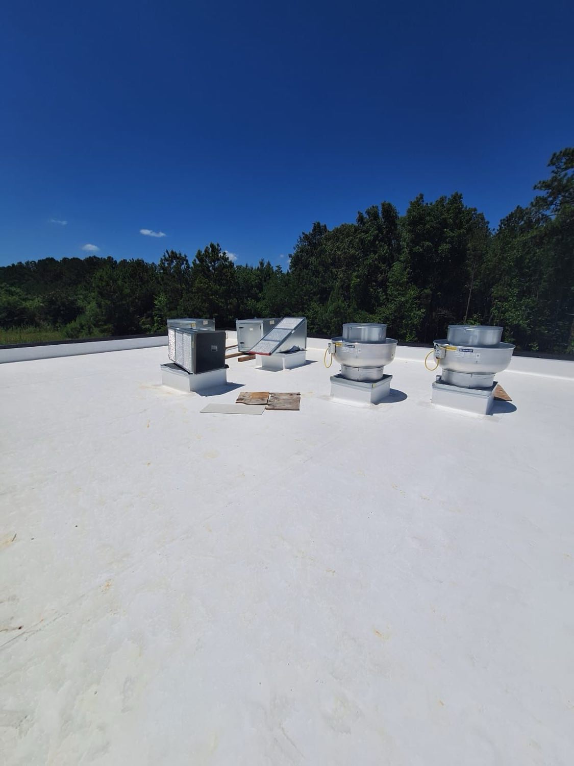 Commercial membrane selected and installed for a Gulf Coast flat roof