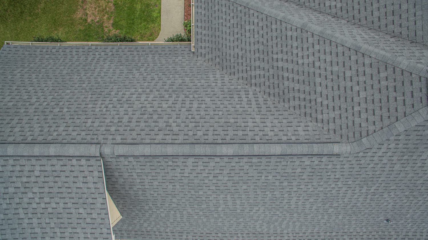Straight architectural shingle courses across a roof field installed by Gulf South Roofing in Diamondhead Mississippi
