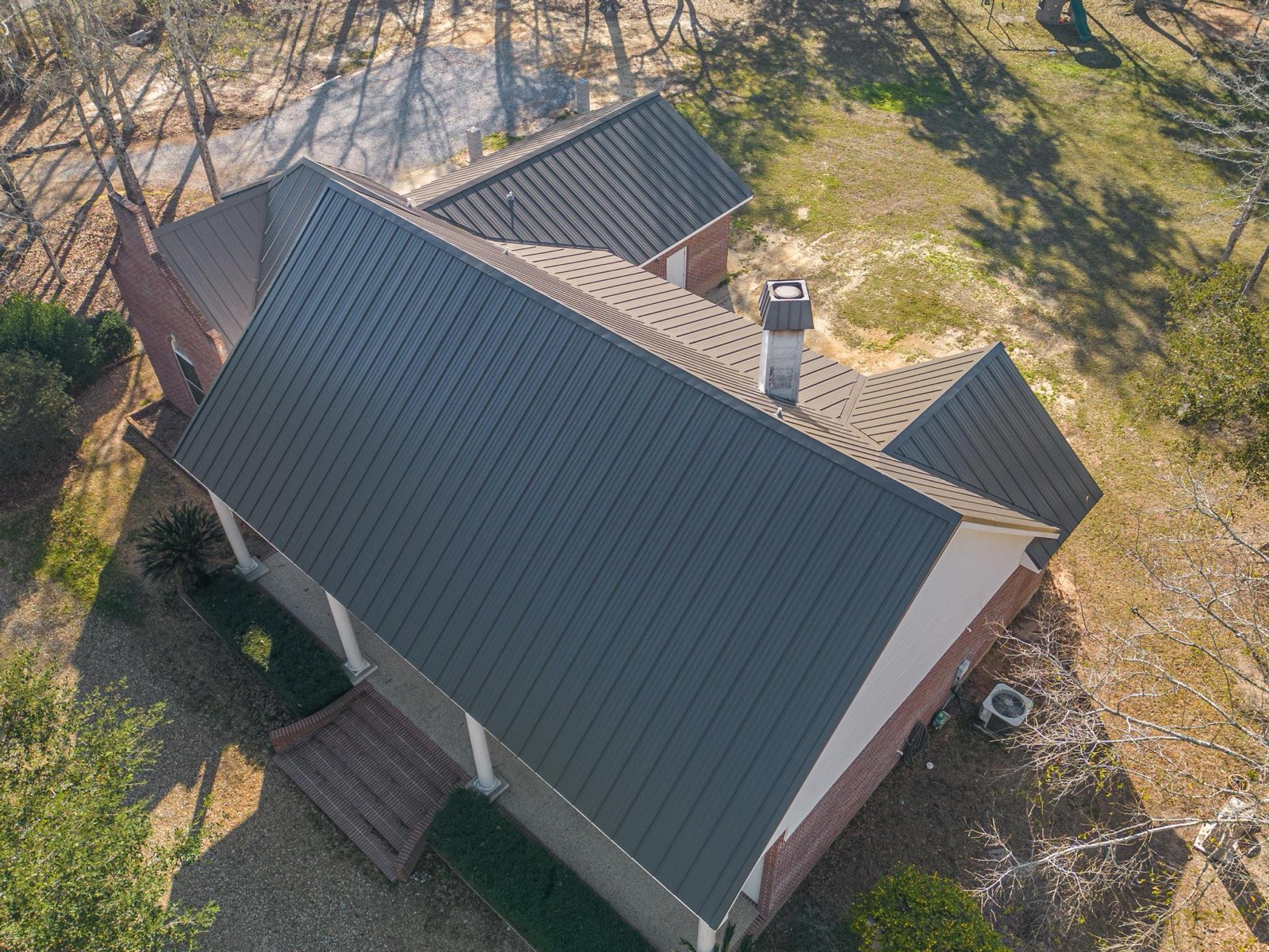 Residential standing seam metal roof on a Biloxi Mississippi brick home