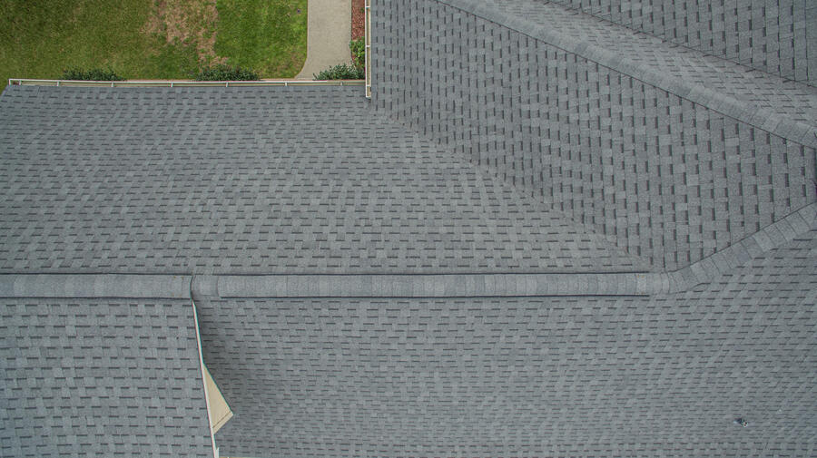 Close view of a shingle field and hip inspected by Gulf South Roofing in Diamondhead Mississippi